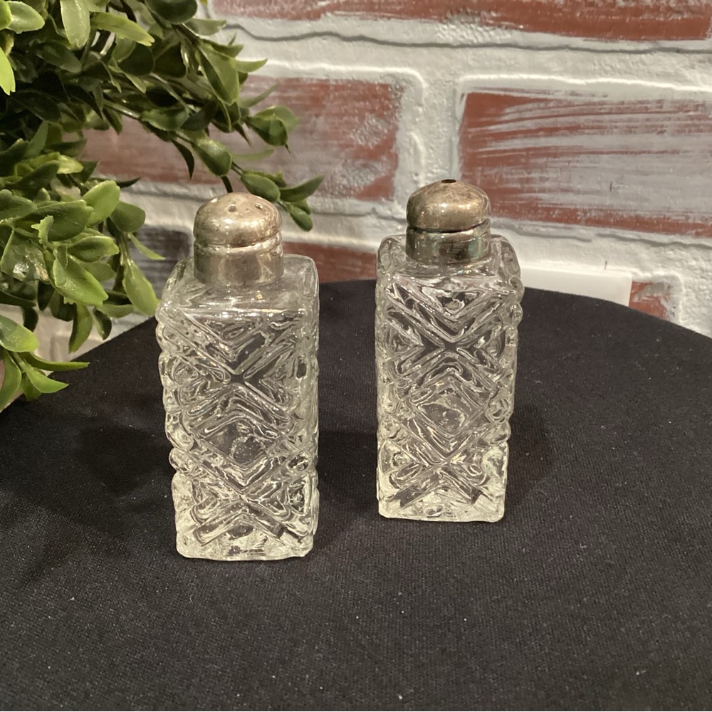 Vintage set of Glass or Crystal Salt N Pepper Shakers - Silver Plate Metal Tops